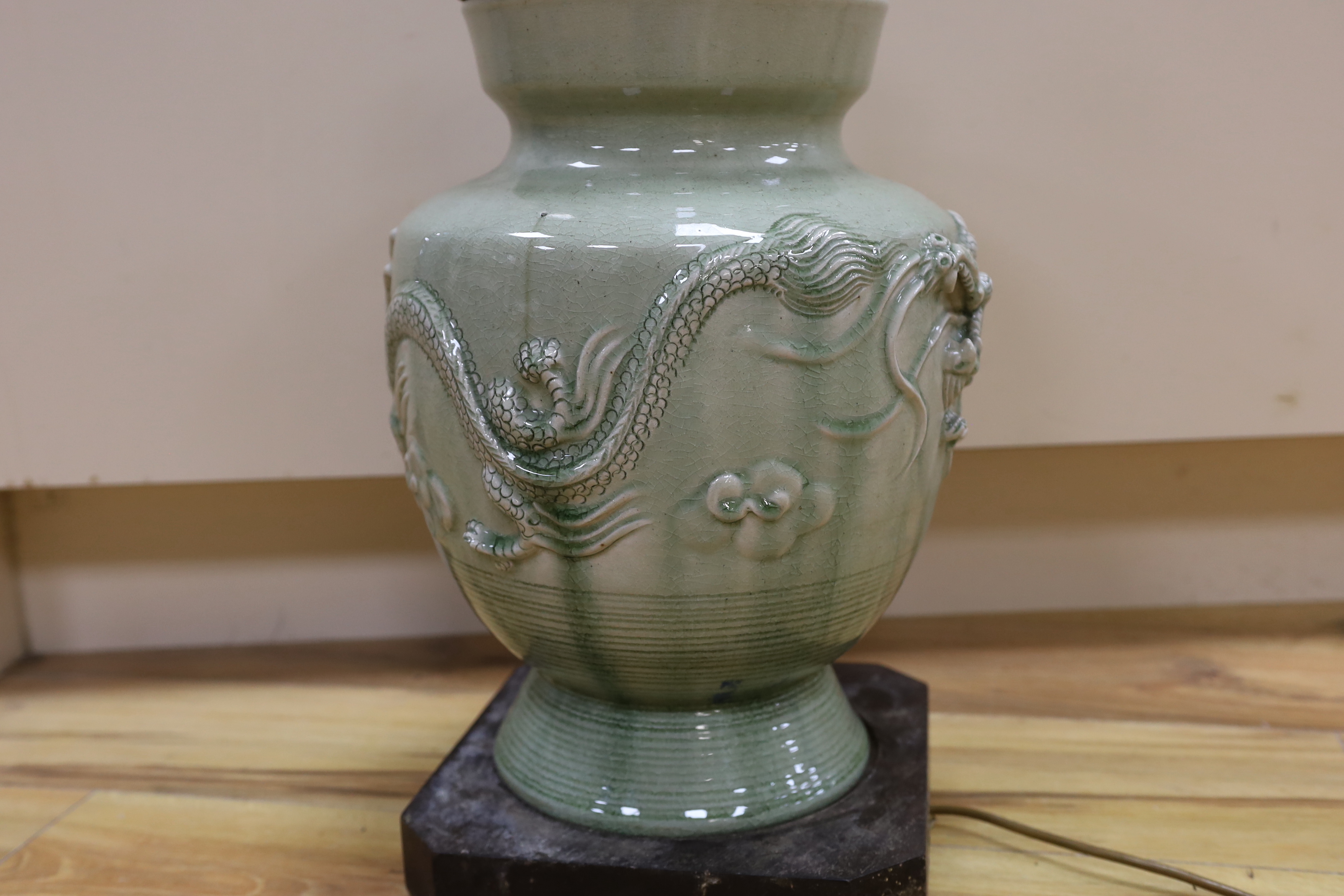 A Chinese celadon glazed lamp, 55cm high